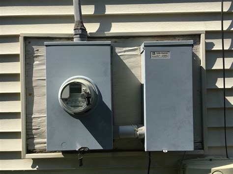 siding behind a meter replacement